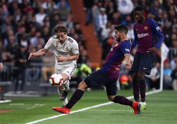 Modric y Luis Suárez.