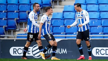 BARCELONA, SPAIN - DECEMBER 20: Raul de Tomas of RCD Espanyol celebrates with his teammates Sergi Darder and Adria Pedrosa after scoring the opening goal during the LaLiga SmartBank match between RCD Espanyol and UD Almeria at RCDE Stadium on December 20,