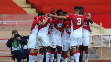 Monaco's Spanish forward Keita Balde (C) is congratulated by teammates after scoring a goal during the French Cup football match between Monaco and Reims at the "Louis II" stadium in Monaco on January 04, 2020. (Photo by VALERY HACHE / AFP)