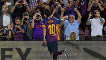 Barcelona&#039;s Argentinian forward Lionel Messi celebrates after scoring a goal during the Spanish league football match between Barcelona and Alaves at the Camp Nou stadium in Barcelona on August 18, 2018. (Photo by LLUIS GENE / AFP)