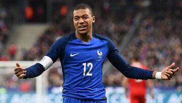 France's forward Kylian Mbappe reacts during the friendly football match between France and Wales at the Stade de France stadium, in Saint-Denis, on the outskirts of Paris, on November 10, 2017. / AFP PHOTO / FRANCK FIFE