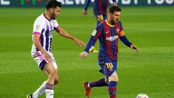 05 April 2021, Spain, Barcelona: Barcelona&#039;s Leo Messi (R) in action during the Spanish Primera Division soccer match between FC Barcelona and Valladolid FC at Camp Nou. Photo: Gerard Franco Crespo/DAX via ZUMA Wire/dpa
 Gerard Franco Crespo/DAX via 