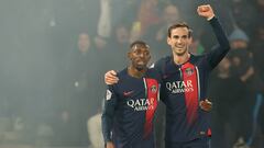 Paris Saint-Germain's Spanish midfielder #08 Fabian Ruiz (R) celebrates with Paris Saint-Germain's French forward #10 Ousmane Dembele (L) after scoring what was later classified as a Lille own goal during the French L1 football match between Paris Saint-Germain (PSG) and Lille LOSC at the Parc des Princes stadium in Paris, on February 10, 2024. (Photo by ALAIN JOCARD / AFP)