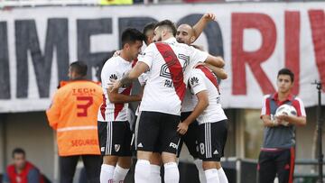 BUENOS AIRES, ARGENTINA - MAY 11: Javier Pinola of River Plate celebrates with teammates after scoring the first goal of his team during a match between River Plate and Estudiantes de La Plata as part of Superliga 2017/18 at Estadio Monumental Antonio Ves