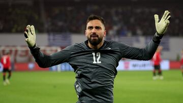 Soccer Football - Euro 2024 Qualifier - Play-off - Georgia v Greece - Boris Paichadze Dinamo Arena, Tbilisi, Georgia - March 26, 2024 Georgia's Giorgi Mamardashvili celebrates during the penalty shootout REUTERS/Irakli Gedenidze