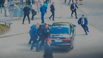 Security officers move Slovak PM Robert Fico in a car after he was injured in a shooting incident, after a Slovak government meeting in Handlova, Slovakia, May 15, 2024. REUTERS/Radovan Stoklasa BEST QUALITY AVAILABLE