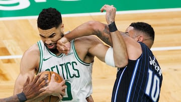 Boston Celtics forward Jayson Tatum (L) keeps the ball from Orlando Magic guard Cory Joseph (R) during the third quarter of the Eastern Conference First Round playoff game one between the Boston Celtics and the Orlando Magic in Boston, Massachusetts, USA, 20 April 2025.