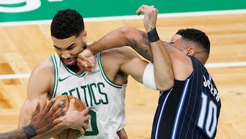 Boston Celtics forward Jayson Tatum (L) keeps the ball from Orlando Magic guard Cory Joseph (R) during the third quarter of the Eastern Conference First Round playoff game one between the Boston Celtics and the Orlando Magic in Boston, Massachusetts, USA, 20 April 2025.