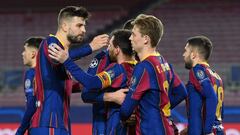 Barcelona&#039;s Argentinian forward Lionel Messi (C) celebrates with teammates after scoring a goal during the UEFA Champions League round of 16 first leg football match between FC Barcelona and Paris Saint-Germain FC at the Camp Nou stadium in Barcelona
