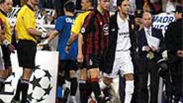 Redondo y Raúl, tras finalizar el partido.