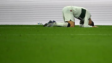 Portugal's forward #07 Cristiano Ronaldo reacts during the Qatar 2022 World Cup quarter-final football match between Morocco and Portugal at the Al-Thumama Stadium in Doha on December 10, 2022. (Photo by Alberto PIZZOLI / AFP)