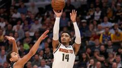 DENVER, COLORADO - APRIL 16: Gary Harris #14 of the Denver Nuggets puts up a shot over Bryn Forbes #11 of San Antonio Spurs in the third quarter during game two of the first round of the NBA Playoffs at the Pepsi Center on April 16, 2019 in Denver, Colorado. NOTE TO USER: User expressly acknowledges and agrees that, by downloading and or using this photograph, User is consenting to the terms and conditions of the Getty Images License Agreement.   Matthew Stockman/Getty Images/AFP
 == FOR NEWSPAPERS, INTERNET, TELCOS &amp; TELEVISION USE ONLY ==