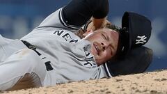 Sep 15, 2023; Pittsburgh, Pennsylvania, USA;  New York Yankees relief pitcher Anthony Misiewicz (54) reacts after being hit in the head by a line drive off the bat of Pittsburgh Pirates second baseman Ji Hwan Bae (not pictured) during the sixth inning at PNC Park. Misiewicz would leave the game.Mandatory Credit: Charles LeClaire-USA TODAY Sports