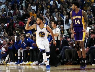 Steph Curry celebrates landing a basket for the Golden State Warriors.