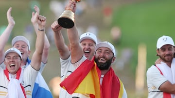 FILE PHOTO: Golf - The 2025 Ryder Cup - Bethpage Black Golf Course, Farmingdale, New York, United States - September 28, 2025 Team Europe's Jon Rahm celebrates with the trophy during the presentation after winning the Ryder Cup REUTERS/Paul Childs/File Photo