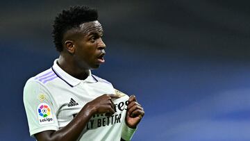 Real Madrid's Brazilian forward Vinicius Junior celebrates scoring the opening goal during the Spanish League football match between Real Madrid CF and CA Osasuna at the Santiago Bernabeu stadium in Madrid on October 2, 2022. (Photo by JAVIER SORIANO / AFP)