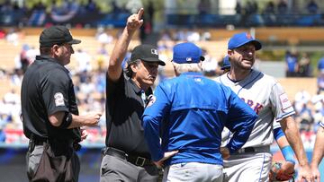 Apr 19, 2023; Los Angeles, California, USA; New York Mets starting pitcher Max Scherzer (21) is ejected by first base umpire Phil Cuzzi (10) as home plate umpire Dan Bellino (2) and manager New York Mets manager Buck Showalter (11) watch in the fourth inning against the Los Angeles Dodgers at Dodger Stadium. Mandatory Credit: Kirby Lee-USA TODAY Sports