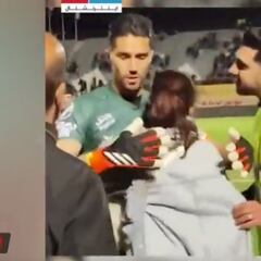 Iranian soccer player suspended and fined for hugging a woman