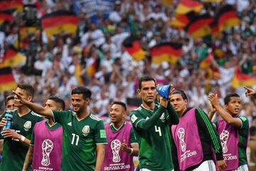 (From left) Mexico's Carlos Vela and Raf Márquez celebrate their 1-0 victory over Germany.