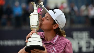 Australia's Cameron Smith kisses the Claret Jug, the trophy for the Champion golfer of the year after winning the 150th British Open Golf Championship on The Old Course at St Andrews in Scotland on July 17, 2022. - Australia's Cameron Smith claimed his first major title on Sunday after a stunning final round of 64 saw him win the 150th British Open at St Andrews by a one-stroke margin. (Photo by Andy Buchanan / AFP) / RESTRICTED TO EDITORIAL USE