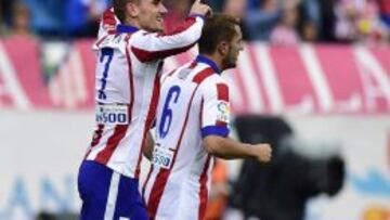 Griezmann y Koke.
