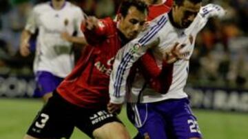 <b>EL ESPÍRITU LOCAL. </b>Varios jugadores celebran el gol de Ponzio ante el Málaga, en el último partido jugado en La Romareda.