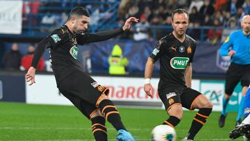 Marseille's Spanish defender Alvaro Gonzalez (L) kicks the ball and scores his goal during the French Cup football match US Granville vs Olympique de Marseille at the Michel-d'Ornano stadium in Caen on January 17, 2020. (Photo by DAMIEN MEYER /