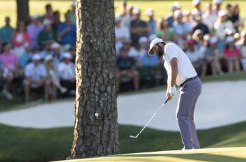 Golfer Scottie Scheffler of the US on the 15th green during the third round of the Masters Tournament at the Augusta National Golf Club