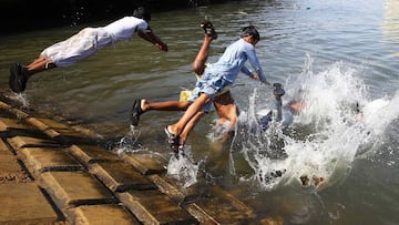 Children play in water in Karachi, Pakistan.