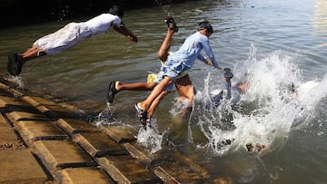 Children play in water in Karachi, Pakistan. 