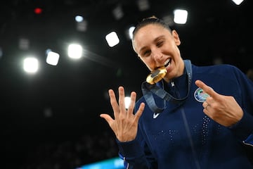 Gold medallist Diana Taurasi poses after the women's Gold Medal basketball match between France and the USA.