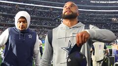 ARLINGTON, TEXAS - SEPTEMBER 18: Dak Prescott #4 of the Dallas Cowboys tosses his hat into the stands after their 20-17 win against the Cincinnati Bengals at AT&T Stadium on September 18, 2022 in Arlington, Texas.   Richard Rodriguez/Getty Images/AFP