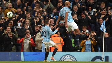 Manchester City&#039;s Belgian defender Vincent Kompany celebrates scoring the opening goal during the English Premier League football match between Manchester City and Leicester City at the Etihad Stadium in Manchester, north west England, on May 6, 2019