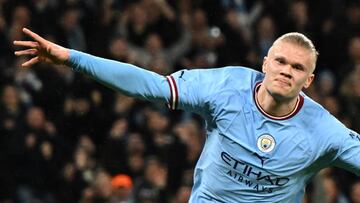 Manchester City's Norwegian striker Erling Haaland celebrates after scoring the opening goal in the English FA Cup quarter-final football match between Manchester City and Burnley at the Etihad Stadium in Manchester, north-west England, on March 18, 2023. (Photo by Oli SCARFF / AFP) / RESTRICTED TO EDITORIAL USE. No use with unauthorized audio, video, data, fixture lists, club/league logos or 'live' services. Online in-match use limited to 120 images. An additional 40 images may be used in extra time. No video emulation. Social media in-match use limited to 120 images. An additional 40 images may be used in extra time. No use in betting publications, games or single club/league/player publications. / (Photo by OLI SCARFF/AFP via Getty Images)