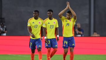 Colombia's midfielder #14 Jordan Barrera celebrates with teammates Colombia's defender #17 Juan Arizala and Colombia's midfielder #23 Neiser Villarreal after scoring a goal during the 2025 South American U-20 football championship final round match between Colombia and Paraguay at the Brígido Iriarte stadium in Caracas on February 4, 2025. (Photo by Edison GAMEZ / AFP) (Photo by EDISON GAMEZ/AFP via Getty Images)