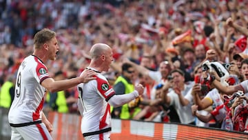 Soccer Football - UEFA Conference League - Quarter Final - First Leg - Rayo Vallecano v AEK Athens - Campo de Futbol de Vallecas, Madrid, Spain - April 9, 2026 Rayo Vallecano's Isi Palazon celebrates scoring their third goal with Alemao REUTERS/Gonzalo Fuentes