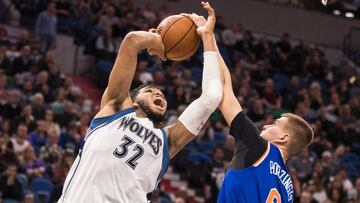 Nov 30, 2016; Minneapolis, MN, USA; New York Knicks forward Kristaps Porzingis (6) blocks Minnesota Timberwolves forward Karl-Anthony Towns (32) during the fourth quarter at Target Center. The Knicks defeated the Timberwolves 106-104. Mandatory Credit: Brace Hemmelgarn-USA TODAY Sports