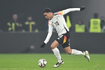 Jamal Musiala runs with the ball during the UEFA Nations League match against Hungary.