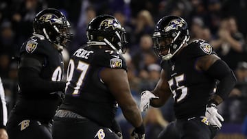 BALTIMORE, MD - NOVEMBER 27: Outside Linebacker Terrell Suggs #55 and nose tackle Michael Pierce #97 of the Baltimore Ravens celebrate after a sack in the second quarter at M&amp;T Bank Stadium on November 27, 2017 in Baltimore, Maryland.   Scott Taetsch/Getty Images/AFP
 == FOR NEWSPAPERS, INTERNET, TELCOS &amp; TELEVISION USE ONLY ==