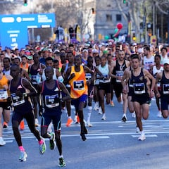El exrefugiado Abraham cruza el Arco del Triunfo con récord y homenaje a Kiptum