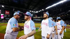 PHOENIX, AZ - MARCH 14:  Manager Benji Gil #30 and Alex Verdugo #27 of Team Mexico celebrate with teammates after Team Mexico defeated Team Great Britain in Game 8 of Pool Cat Chase Field on Tuesday, March 14, 2023 in Phoenix, Arizona. (Photo by Daniel Shirey/WBCI/MLB Photos via Getty Images)