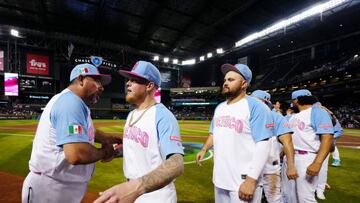 PHOENIX, AZ - MARCH 14: Manager Benji Gil #30 and Alex Verdugo #27 of Team Mexico celebrate with teammates after Team Mexico defeated Team Great Britain in Game 8 of Pool Cat Chase Field on Tuesday, March 14, 2023 in Phoenix, Arizona. (Photo by Daniel Shirey/WBCI/MLB Photos via Getty Images)