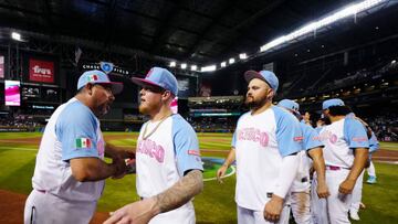 PHOENIX, AZ - MARCH 14:  Manager Benji Gil #30 and Alex Verdugo #27 of Team Mexico celebrate with teammates after Team Mexico defeated Team Great Britain in Game 8 of Pool Cat Chase Field on Tuesday, March 14, 2023 in Phoenix, Arizona. (Photo by Daniel Shirey/WBCI/MLB Photos via Getty Images)