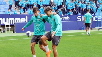 Larrubia y Kevin en el último entrenamiento a puerta abierta en La Rosaleda.