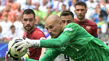 Serbia's goalkeeper #01 Predrag Rajkovic makes a save during the UEFA Euro 2024 Group C football match between Slovenia and Serbia at the Munich Football Arena in Munich, southern Germany, on June 20, 2024. (Photo by DAMIEN MEYER / AFP)