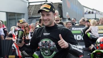 CASTLE DONINGTON, ENGLAND - MAY 28: Jonathan Rea of Great Britain and KAWASAKI RACING TEAM celebrates the victory under the podium at the end of the Superbike Race 2 during the FIM Superbike World Championship - Race at Donington Park on May 28, 2017 in Castle Donington, England. (Photo by Mirco Lazzari gp/Getty Images)