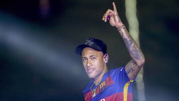 (FILES) This file photo taken on May 23, 2016 shows Barcelona's Brazilian forward Neymar acknowledging the crowd during celebrations at the Camp Nou stadium in Barcelona following their Spanish "Copa del Rey" (King's Cup) final football match 2-0 victory over Sevilla FC yesterday also marking the club's 28th Copa del Rey win and the 24th Spanish Liga title.
Barcelona are seeking at least 8.5 million euros ($10 million) from Neymar for breach of contract, the club said on August 22, 2017 following his world record 222-million-euro move to Paris Saint-Germain. / AFP PHOTO / Josep LAGO