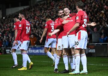 Paul Mullin celebrates scoring with striker Elliot Lee.