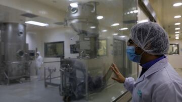 Laboratory technicians work on the production of Molnupiravir, a drug used in the treatment of the coronavirus disease (COVID-19), in the wet granulation unit of Eva Pharma in Cairo, Egypt, February 1, 2022. REUTERS/Amr Abdallah Dalsh