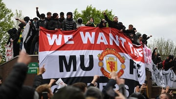 Supporters protest against Manchester United's owners, outside English Premier League club Manchester United's Old Trafford stadium in Manchester, north west England on May 2, 2021, ahead of their English Premier League fixture against Liverpool